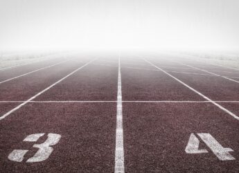 running track, numbers, fog