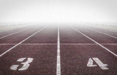 running track, numbers, fog