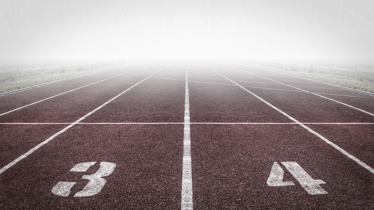 running track, numbers, fog